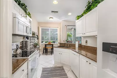 4680 Hawks Nest Way #D-103, Naples, FL 34114 - Photo 9