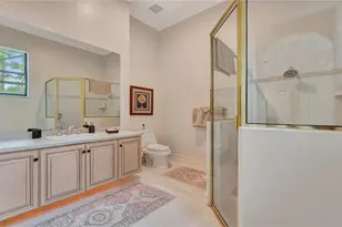 11238 5 Oaks Ln, Naples, FL 34120 - Photo 9