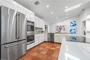 2419 Pinewoods Cir, Naples, FL 34105 - Photo 13