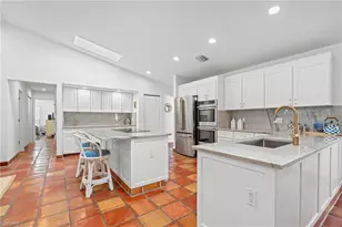 2419 Pinewoods Cir, Naples, FL 34105 - Photo 15