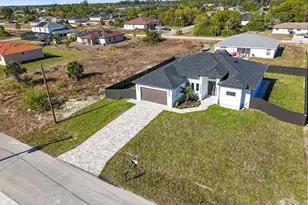 2407 Carvell Ave N, Lehigh Acres, FL 33971 - Photo 35