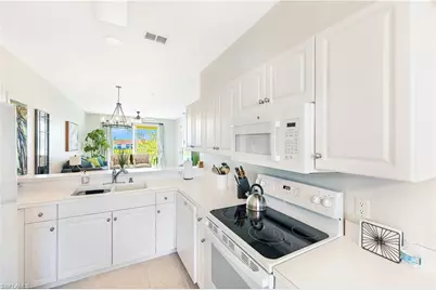 2730 Cypress Trace Cir #2836A, Naples, FL 34119 - Photo 15