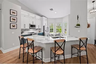 1070 21st St SW, Naples, FL 34117 - Photo 3