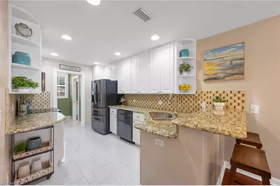 5561 Cove Cir, Naples, FL 34119 - Photo 3