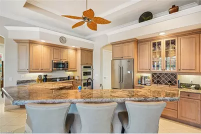 8983 Star Tulip Ct, Naples, FL 34113 - Photo 13