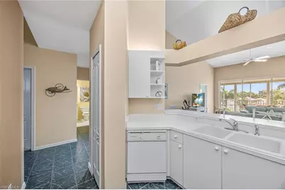 7725 Pebble Creek Cir #305, Naples, FL 34108 - Photo 19