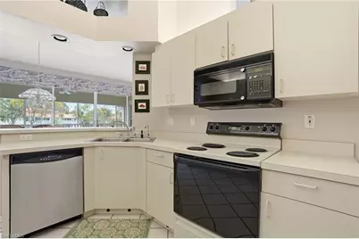 7680 Oleander Gate Dr #J202, Naples, FL 34109 - Photo 13