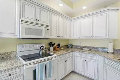 7048 Pelican Bay Blvd #C302, Naples, FL 34108 - Photo 15