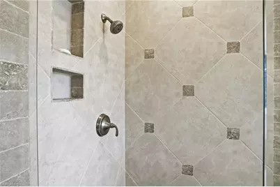 7048 Pelican Bay Blvd #C302, Naples, FL 34108 - Photo 23