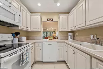 1055 Forest Lakes Dr #E209, Naples, FL 34105 - Photo 3