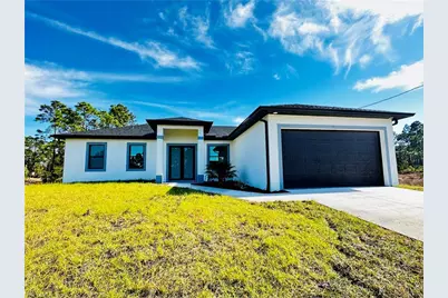 717 Genoa Ave S, Lehigh Acres, FL 33974 - Photo 1
