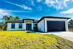 717 Genoa Ave S, Lehigh Acres, FL 33974 - Photo 1