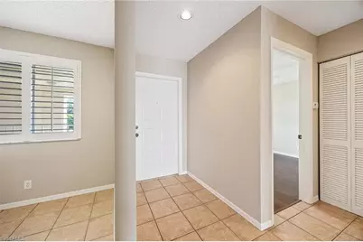 7784 Emerald Cir #O-203, Naples, FL 34109 - Photo 5