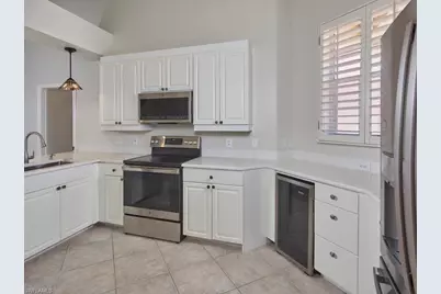 1033 Egrets Walk Cir #203, Naples, FL 34108 - Photo 3