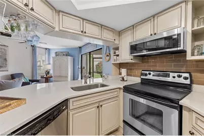 9623 Eaton Gardens Ln #105, Fort Myers, FL 33919 - Photo 1