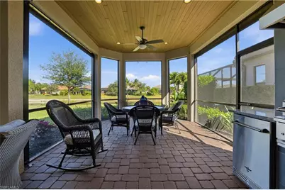 8665 Dilillo Ct, Naples, FL 34119 - Photo 27