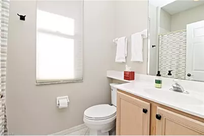 1842 Winding Oaks Way, Naples, FL 34109 - Photo 21