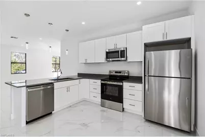 930 Hepburn Ave, Lehigh Acres, FL 33974 - Photo 17