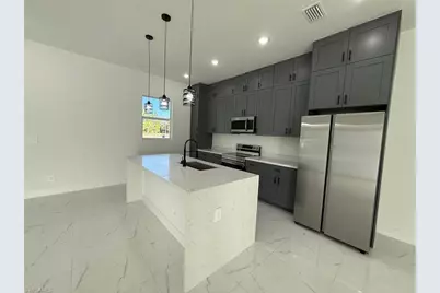 1121 Florence St E, Lehigh Acres, FL 33974 - Photo 13