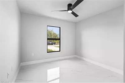 2507 26 St SW, Lehigh Acres, FL 33976 - Photo 7