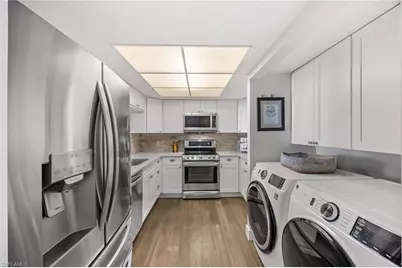 5633 Turtle Bay Dr #32, Naples, FL 34108 - Photo 9