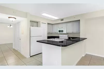 1210 Wildwood Lakes Blvd #106, Naples, FL 34104 - Photo 1