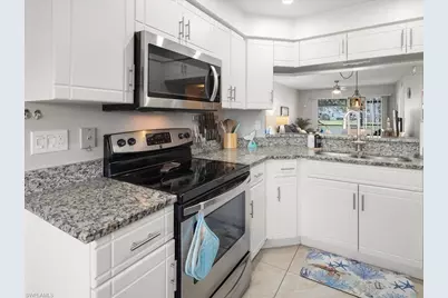 137 Wading Bird Cir #F103, Naples, FL 34110 - Photo 5