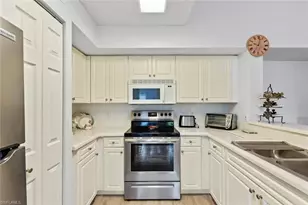 1180 Wildwood Lakes Blvd, Naples, FL 34104 - Photo 13