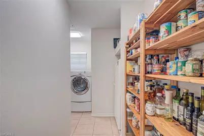 5423 Teak Wood Dr, Naples, FL 34119 - Photo 11