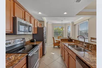 9826 Giaveno Cir #1527, Naples, FL 34113 - Photo 5