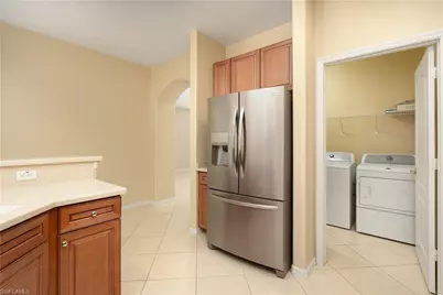 8302 Laurel Lakes Way, Naples, FL 34119 - Photo 5