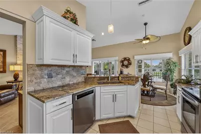 24766 Lakemont Cove Ln #202, Bonita Springs, FL 34134 - Photo 7