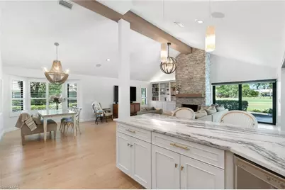 12856 Bald Cypress Ln, Naples, FL 34119 - Photo 17