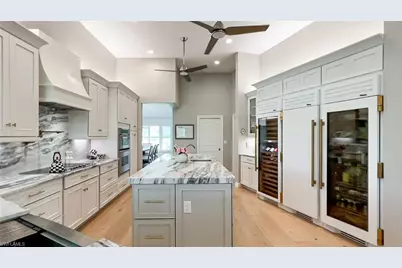 12856 Bald Cypress Ln, Naples, FL 34119 - Photo 13