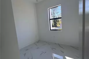 1035 Barcelona St E, Lehigh Acres, FL 33974 - Photo 3