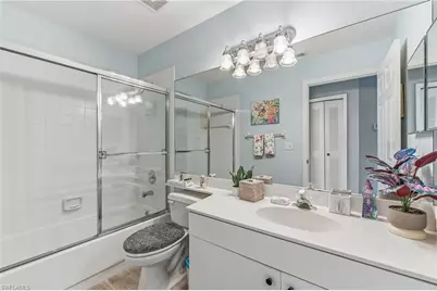 24796 Lakemont Cove Ln #101, Bonita Springs, FL 34134 - Photo 21