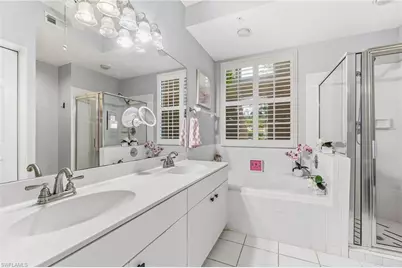 24796 Lakemont Cove Ln #101, Bonita Springs, FL 34134 - Photo 17