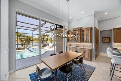 8985 Star Tulip Ct, Naples, FL 34113 - Photo 19