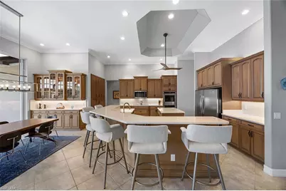 8985 Star Tulip Ct, Naples, FL 34113 - Photo 15