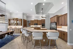 8985 Star Tulip Ct, Naples, FL 34113 - Photo 15