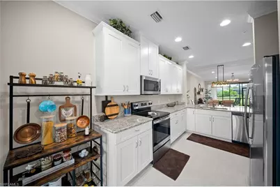 9441 Benvenuto Ct #104, Naples, FL 34119 - Photo 17