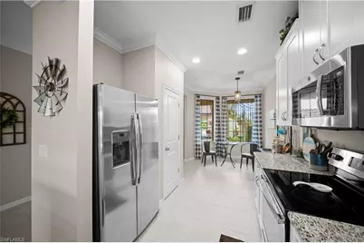 9441 Benvenuto Ct #104, Naples, FL 34119 - Photo 15