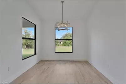 715 Theodore Vail St E, Lehigh Acres, FL 33974 - Photo 9