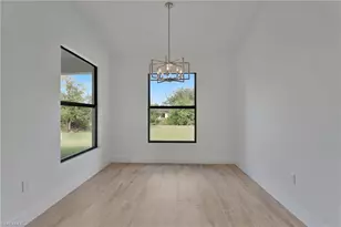 715 Theodore Vail St E, Lehigh Acres, FL 33974 - Photo 9