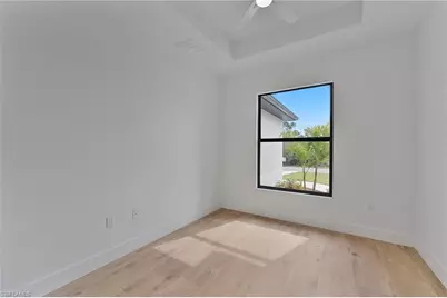 715 Theodore Vail St E, Lehigh Acres, FL 33974 - Photo 17