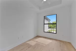 715 Theodore Vail St E, Lehigh Acres, FL 33974 - Photo 17