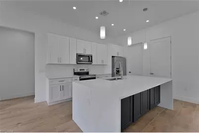 715 Theodore Vail St E, Lehigh Acres, FL 33974 - Photo 7