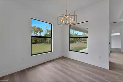 717 Theodore Vail St E, Lehigh Acres, FL 33974 - Photo 9