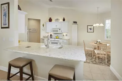 6265 Wilshire Pines Cir #1105, Naples, FL 34109 - Photo 7