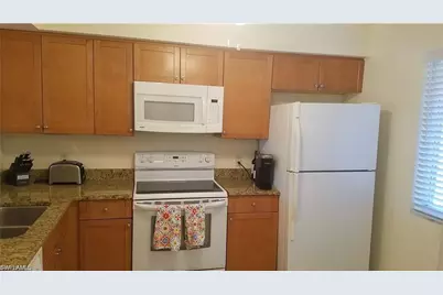 1075 Foxfire Ln #309, Naples, FL 34104 - Photo 3